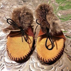 Moccasins,  real leather and real rabbit fur,  has a great insole! Size 8 child